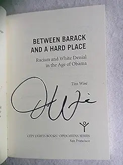 Between Barack and a Hard Place: Racism and White Denial in the Age of Obama